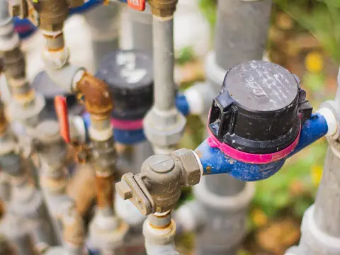Water pipes with valves, meters and colored fittings
